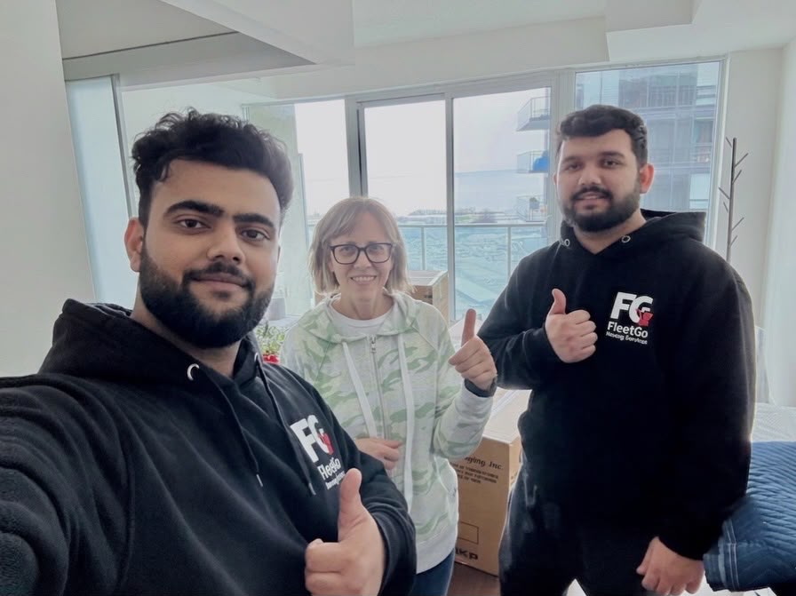 FleetGo moving crew with a customer